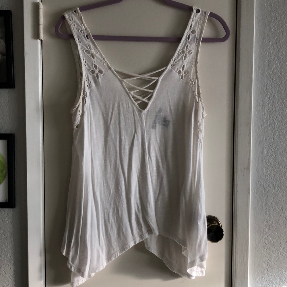 White eyelet trim asymmetrical hem top